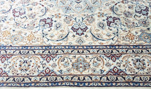 Corner detail of New Nain rug showing border pattern and Wool pile