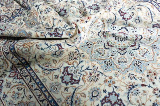 Surface texture of New Nain rug with natural Wool and intricate pattern