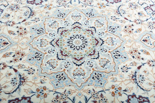 Central medallion detail of New Nain rug from Iran / Persia