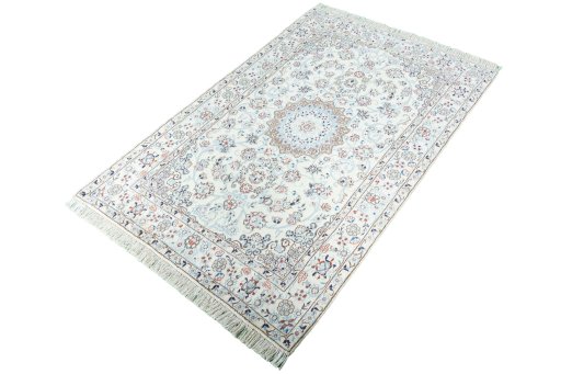 Corner detail of New Nain rug showing border pattern and Cork pile