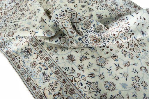 Surface texture of New Nain rug with natural Wool and intricate pattern