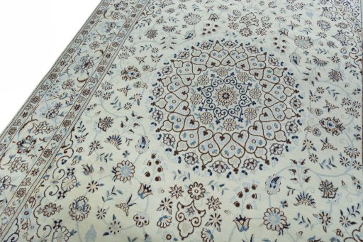 Backside of handmade New Nain rug showing knot structure and weave density