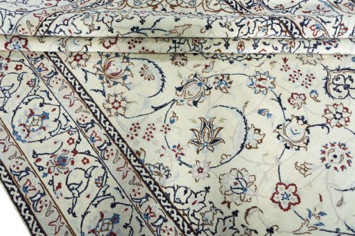 Close-up detail of 2000s Nain rug from Iran / Persia showing Wool weave