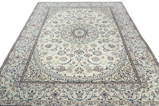 Surface texture of 2000s Nain rug with natural Wool and intricate pattern