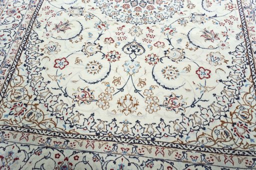 Close-up detail of 2000s Nain rug from Iran / Persia showing Wool weave