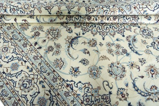 Close-up detail of 2000s Nain rug from Iran / Persia showing Wool weave
