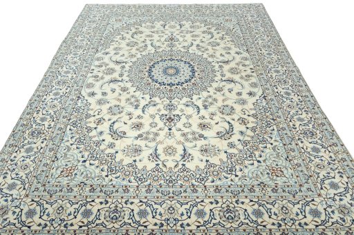 Surface texture of 2000s Nain rug with natural Wool and intricate pattern