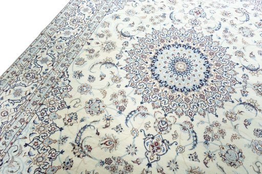 Backside of handmade 2000s Nain rug showing knot structure and weave density
