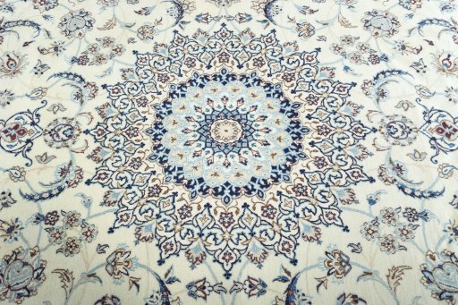 Central medallion detail of 2000s Nain rug from Iran / Persia