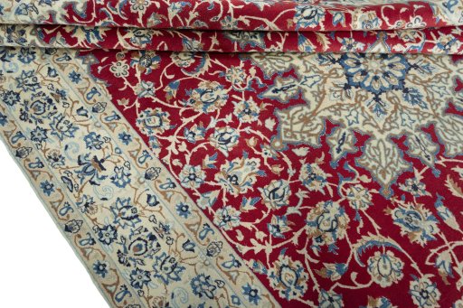 Close-up detail of 2000s Nain rug from Iran / Persia showing Wool weave