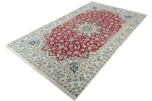 Corner detail of 2000s Nain rug showing border pattern and Wool pile