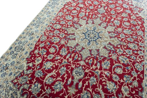 Backside of handmade 2000s Nain rug showing knot structure and weave density