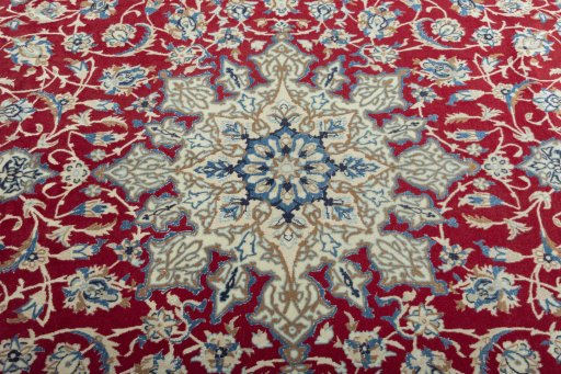 Central medallion detail of 2000s Nain rug from Iran / Persia
