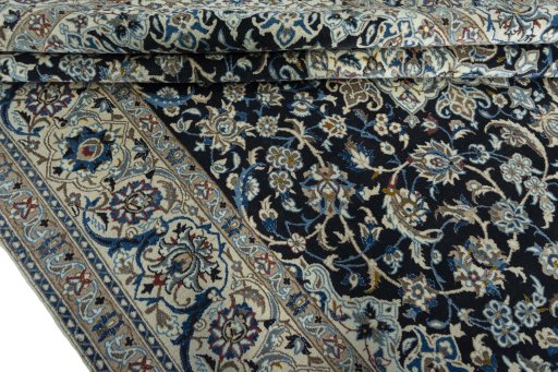 Close-up detail of 2000s Nain rug from Iran / Persia showing Wool weave