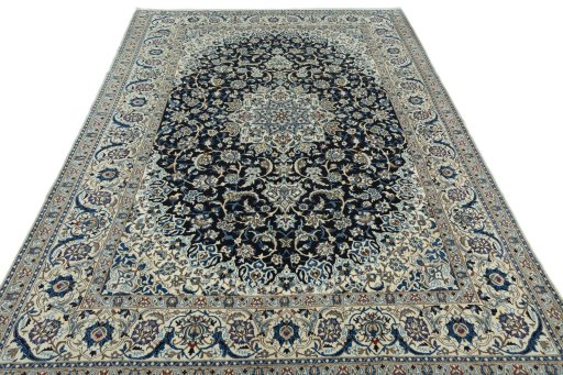 Surface texture of 2000s Nain rug with natural Wool and intricate pattern