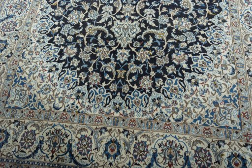 Close-up detail of 2000s Nain rug from Iran / Persia showing Wool weave