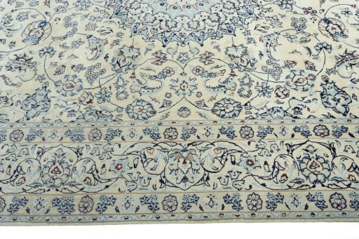 Corner detail of New Nain rug showing border pattern and Wool pile