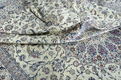 Surface texture of New Nain rug with natural Silk and intricate pattern
