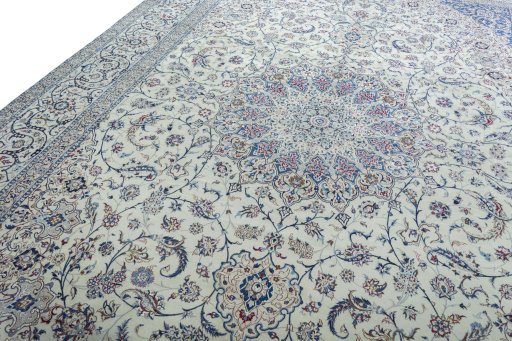 Backside of handmade New Nain rug showing knot structure and weave density