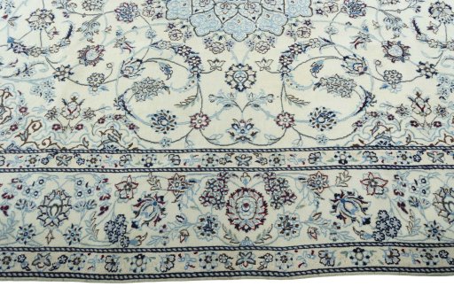 Corner detail of New Nain rug showing border pattern and Wool pile