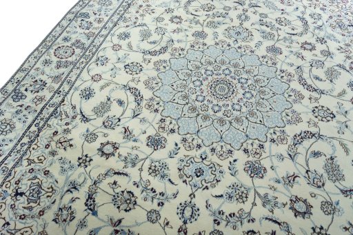 Backside of handmade New Nain rug showing knot structure and weave density
