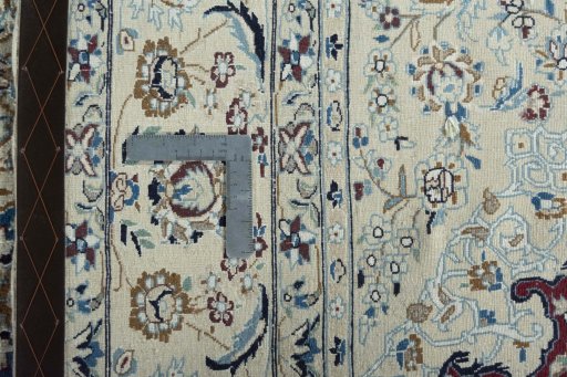 Backside of handmade New Nain rug showing knot structure and weave density