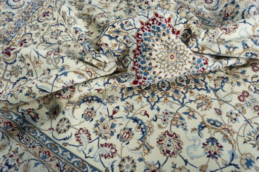 Surface texture of 2000s Nain rug with natural Wool and intricate pattern