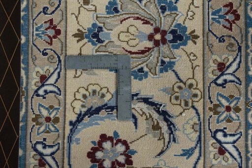Backside of handmade 2000s Nain rug showing knot structure and weave density