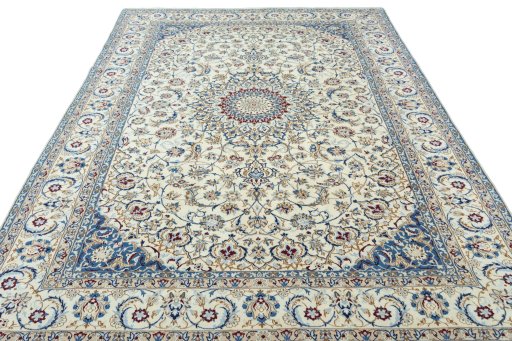 Surface texture of 2000s Nain rug with natural Wool and intricate pattern
