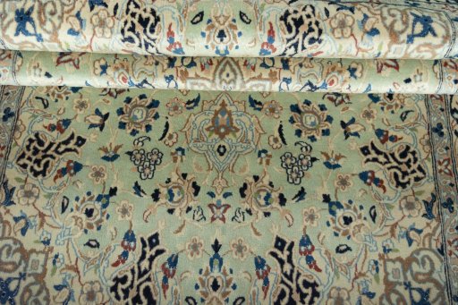 Close-up detail of 2000s Nain rug from Iran / Persia showing Wool weave