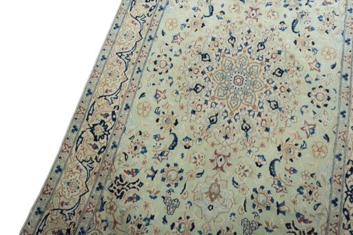 Backside of handmade 2000s Nain rug showing knot structure and weave density