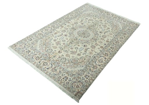 Corner detail of 2000s Nain rug showing border pattern and Wool pile