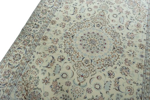 Backside of handmade 2000s Nain rug showing knot structure and weave density