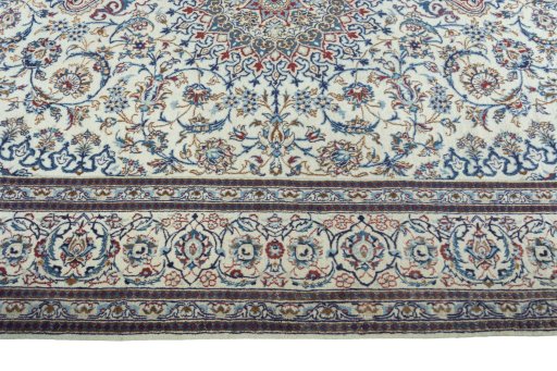 Corner detail of New Nain rug showing border pattern and Wool pile