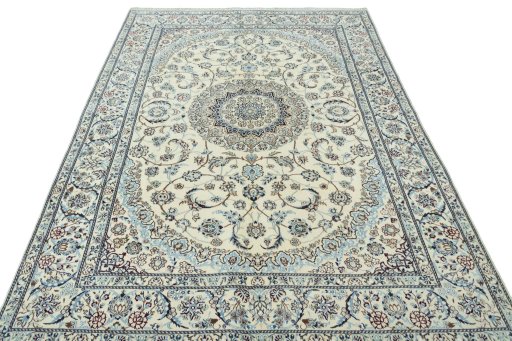 Surface texture of 2000s Nain rug with natural Wool and intricate pattern