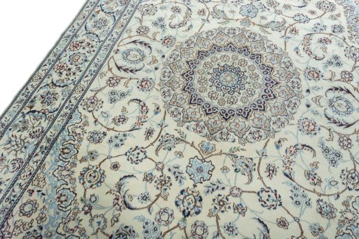 Backside of handmade 2000s Nain rug showing knot structure and weave density