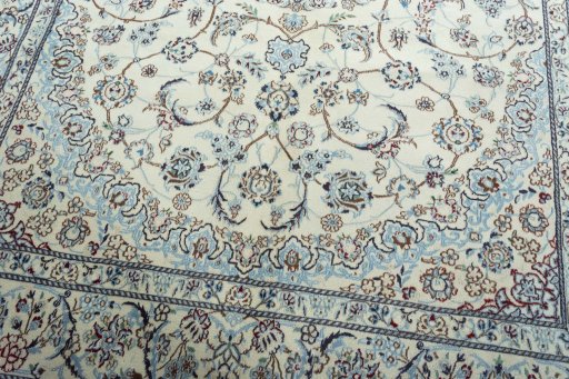 Close-up detail of 2000s Nain rug from Iran / Persia showing Wool weave