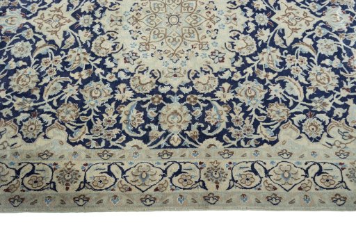 Corner detail of 2000s Nain rug showing border pattern and Wool pile
