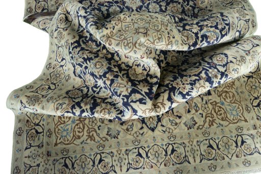 Surface texture of 2000s Nain rug with natural Wool and intricate pattern