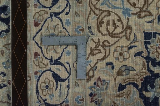 Backside of handmade 2000s Nain rug showing knot structure and weave density