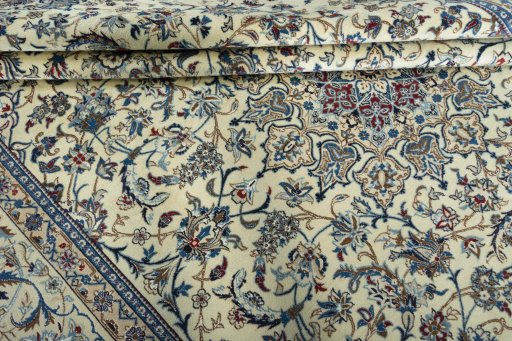 Close-up detail of 2000s Nain rug from Iran / Persia showing Wool weave