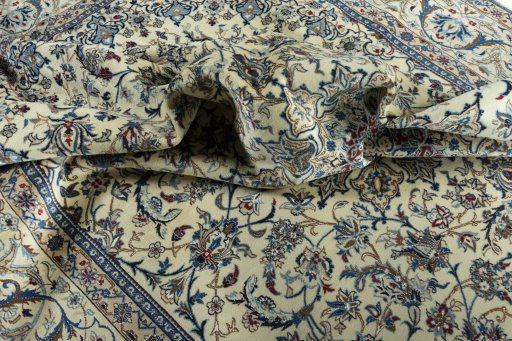Surface texture of 2000s Nain rug with natural Wool and intricate pattern