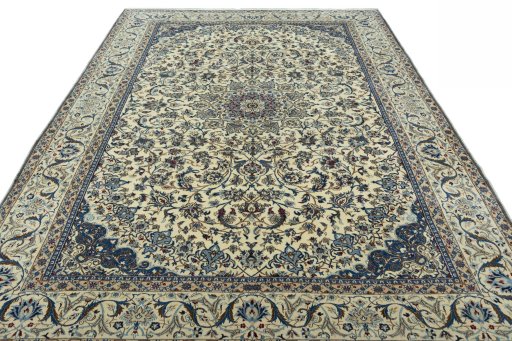 Surface texture of 2000s Nain rug with natural Wool and intricate pattern