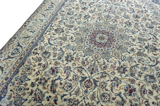 Backside of handmade 2000s Nain rug showing knot structure and weave density