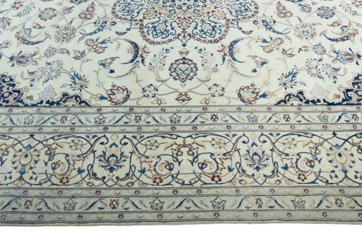 Corner detail of New Nain rug showing border pattern and Wool pile