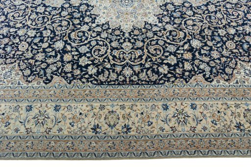 Corner detail of 1970s Nain rug showing border pattern and Cork pile
