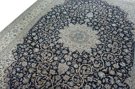 Backside of handmade 1970s Nain rug showing knot structure and weave density