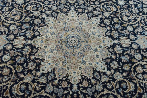 Central medallion detail of 1970s Nain rug from Iran / Persia