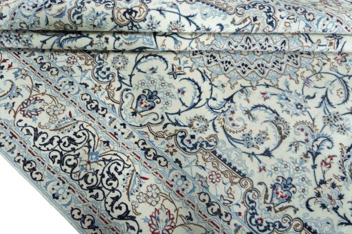 Close-up detail of 2000s Nain rug from Iran / Persia showing Wool weave