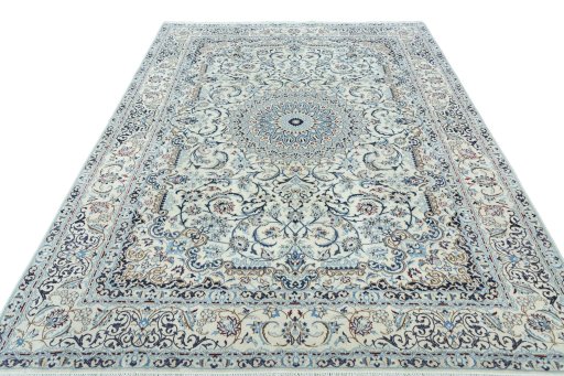 Surface texture of 2000s Nain rug with natural Wool and intricate pattern